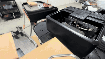 Checking that no wiring is pinched as the unit seats