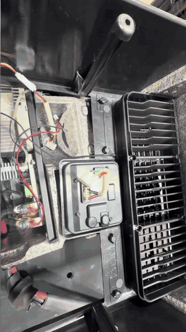 Removing the display cover and lifting out the display circuit board